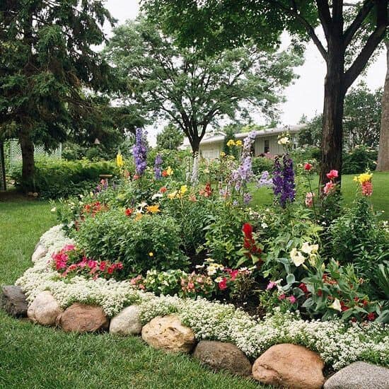 Large Rocks Contrast Soft Flower Bed