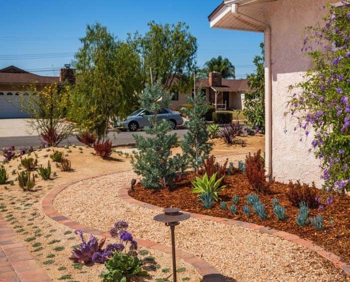 Showcase Your Home’s Beauty with a Pea Gravel Walkway