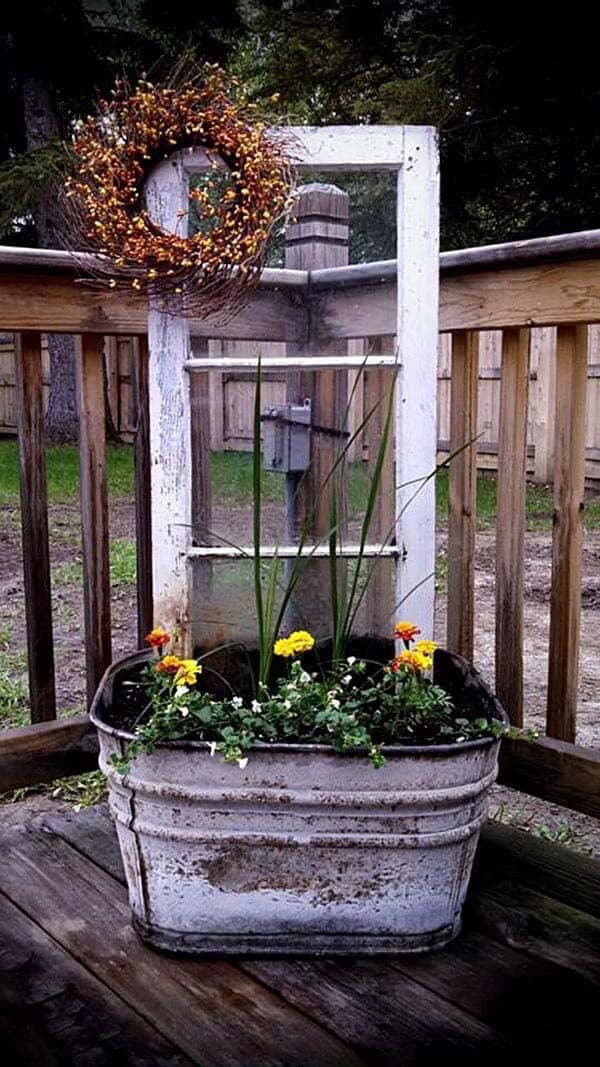 Rustic Flower Display with Window in a Wrought Iron Washtub