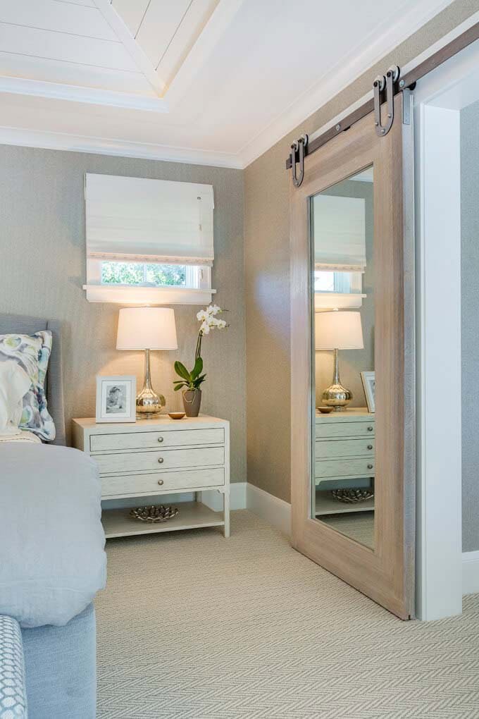 Add a Modern Touch to a Bedroom with Mirrored Barn Doors