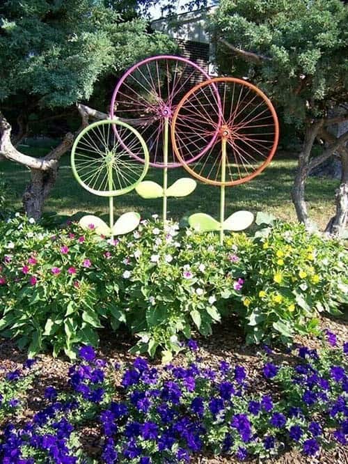 Make a Statement with Colorful Bicycle Wheels Garden Decor