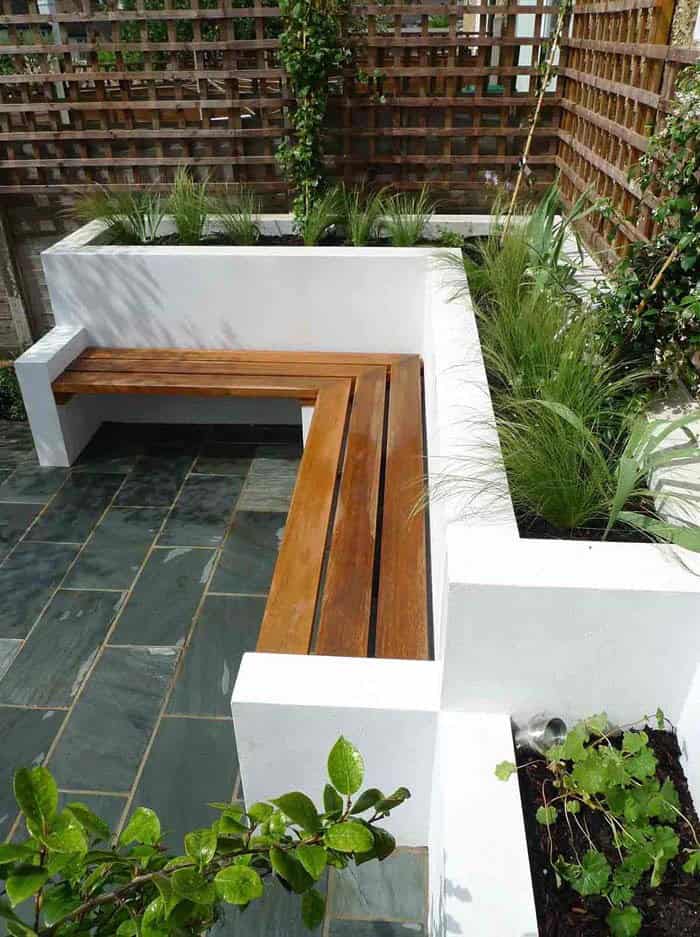 Functional Patio with Rustic Benches and Built-In Planters