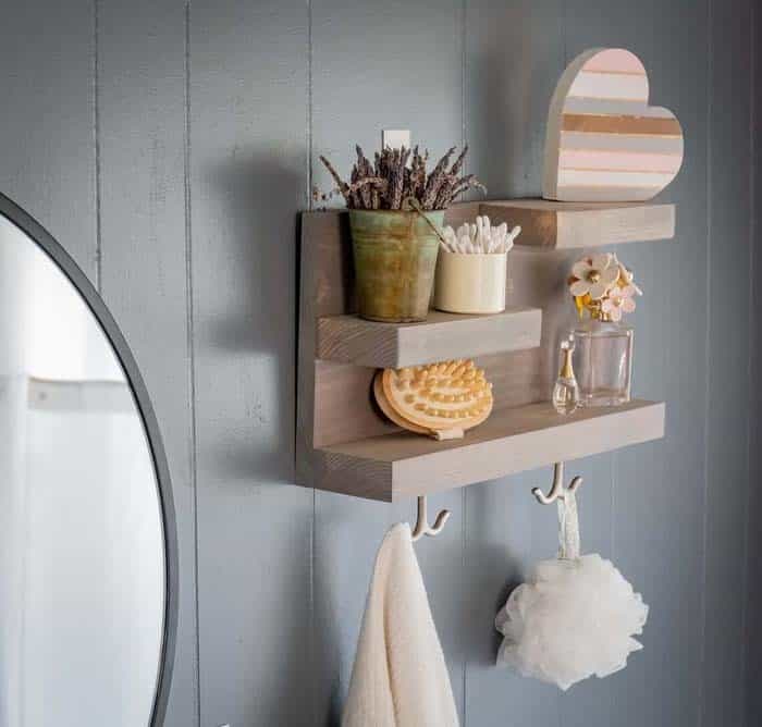 Transform a Bathroom with Muted Step Shelves with Hooks