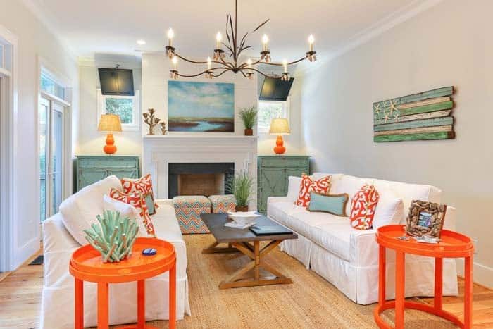 Cheerful Beach House Living Room With Coral Color Accents