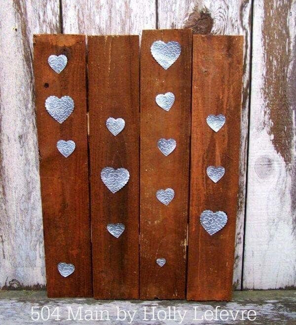 Enhance Your Pallet Wood Decor with Embossed Metal Hearts