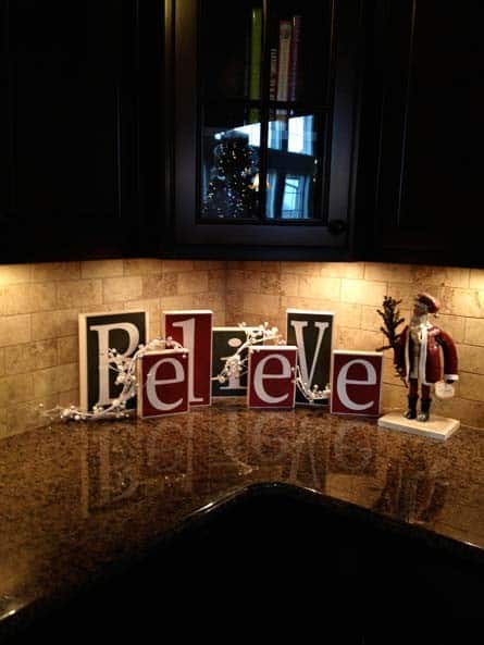 Place a Christmas Believe Sign on Kitchen Countertop