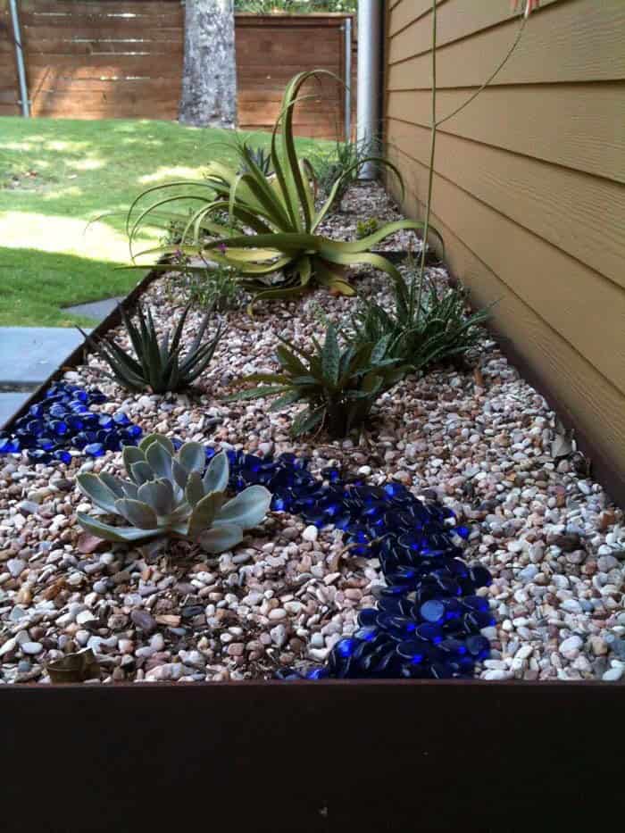 Add a Pop of Blue to Your Garden with Glass Pebbles