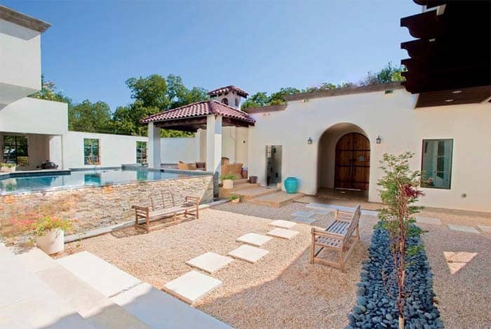 Desert Pool with Stone Facade and Turquoise Tile