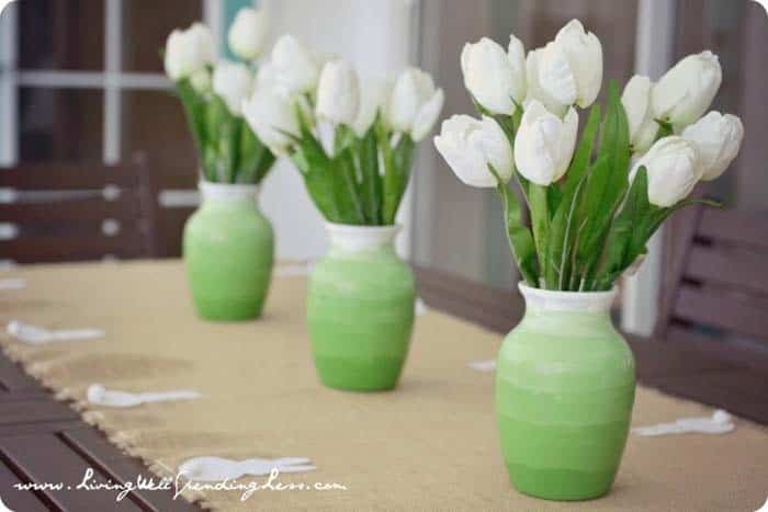 Utilize Vibrant Green Vases with White Roses