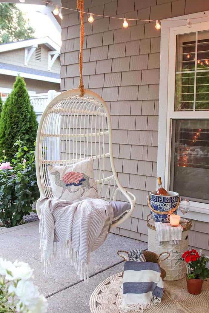 Reading Nook for Your Porch with a Wicker Chair Hammock