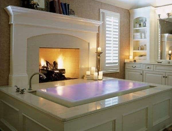 Create a Haven with a Fireplace and Drop-In Bathtub