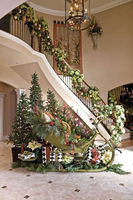 Adorn Your Staircase Garland with a Rustic Santa Sleigh