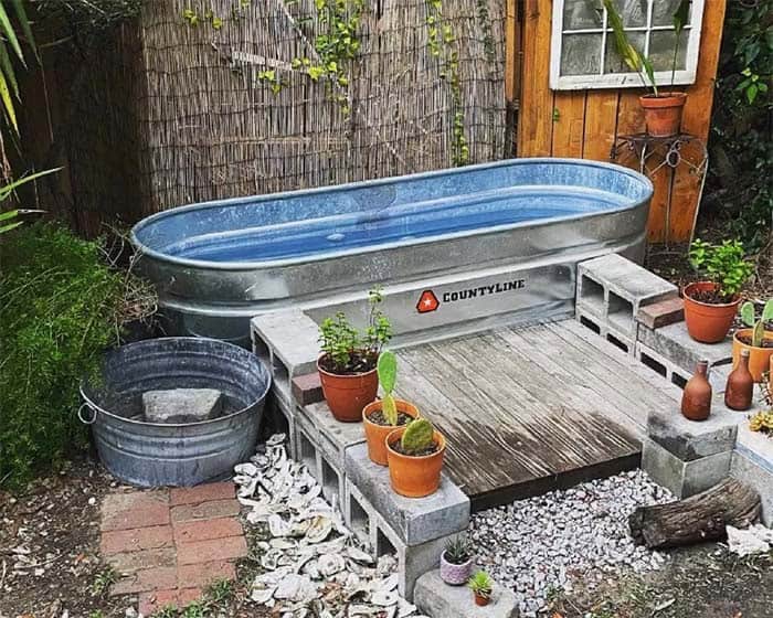 Rustic Oasis From Oval Stock Tank Pool