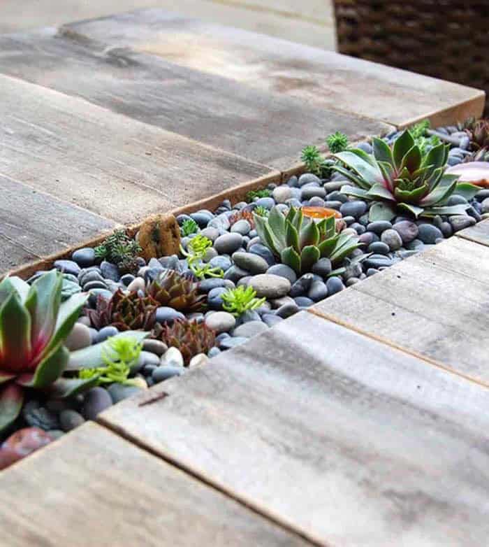 Incorporate Built-in Planters with Stones and Succulents