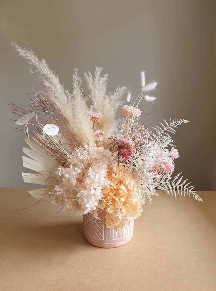 Pale Florals Arranged in Pale Pink Vase