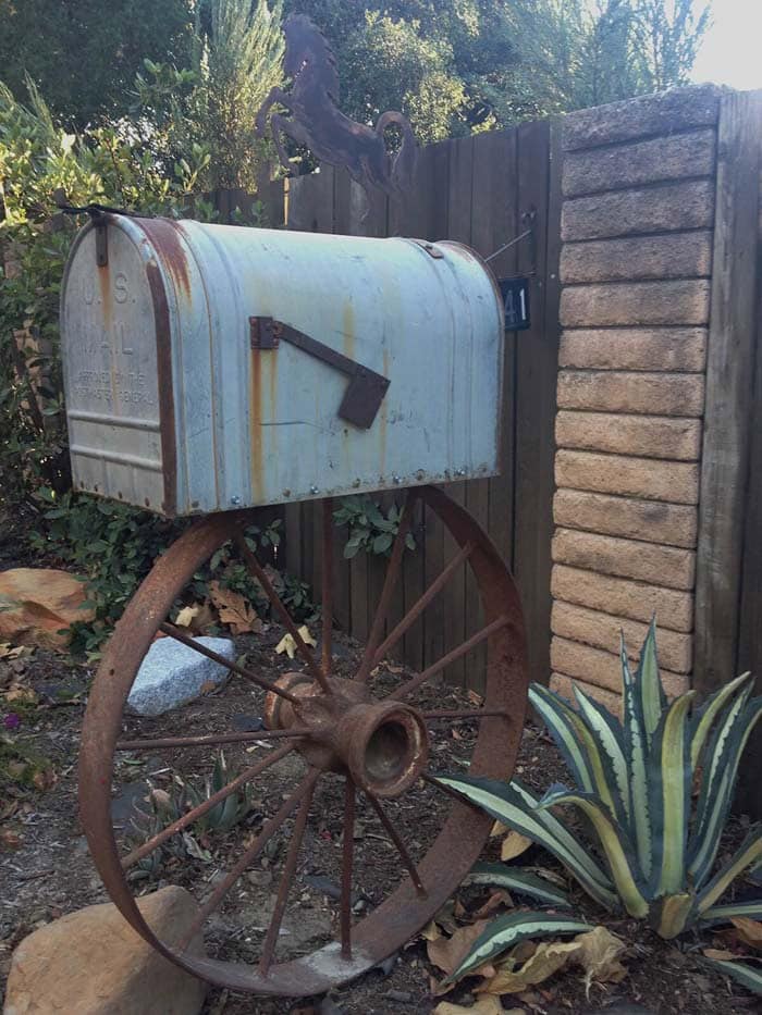 Western Wagon Wheel Supports Vintage Mailbox