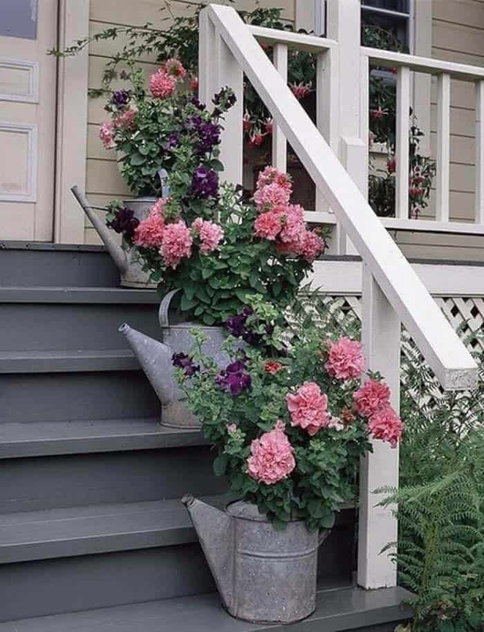 Incorporate Watering Cans into a Shabby Chic Garden