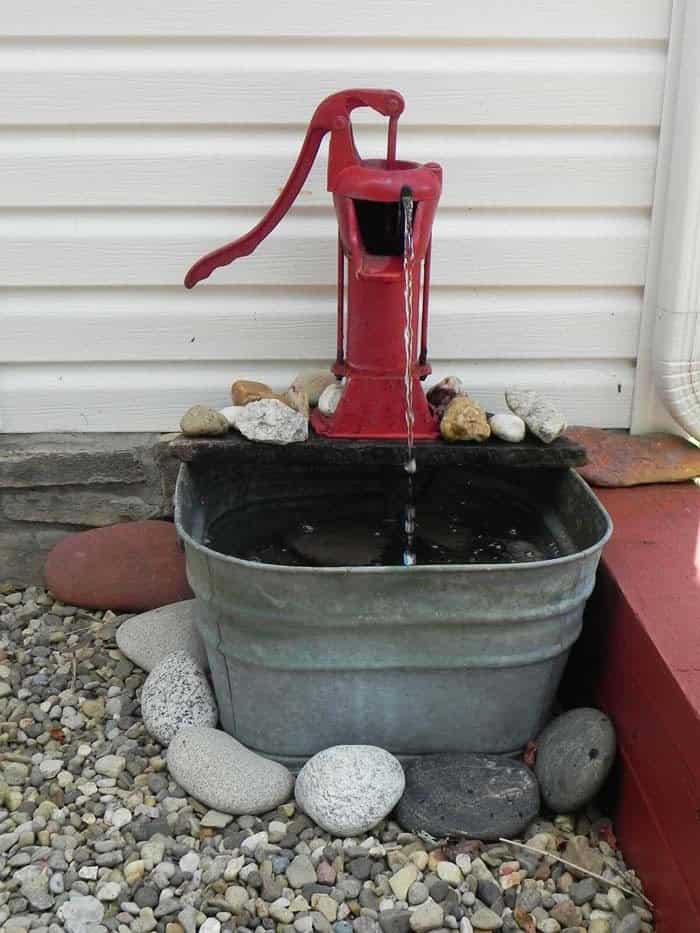 Rustic Water Feature with Galvanized Tub and Vintage Pump