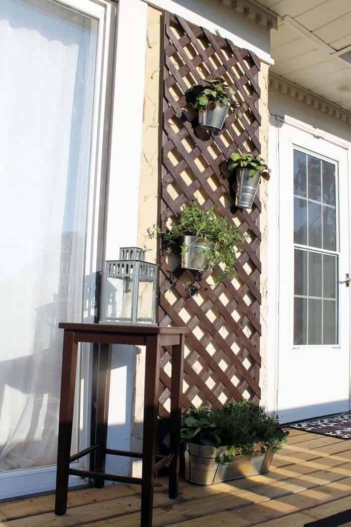 Create a Rustic Porch with a Wall Lattice for Hanging Flowers