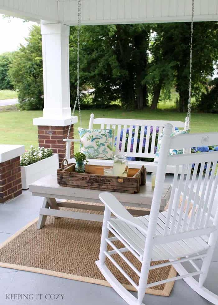 Porch with Farmhouse Furniture and Flower Planters