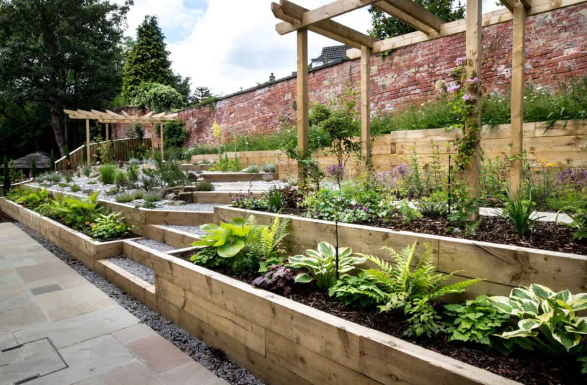 Tiered Garden With Retaining Walls From Wood Boards