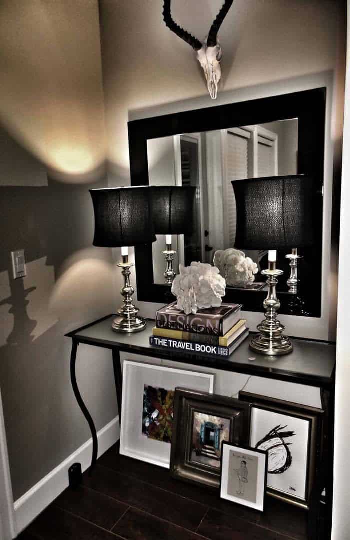 Utilize Mirrors in Entryways to Create a Spacious Illusion