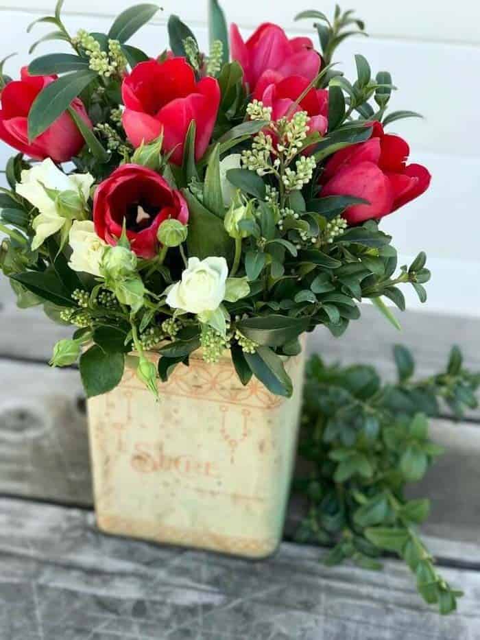 Creamy Vintage Vase Holds Beautiful Arrangement