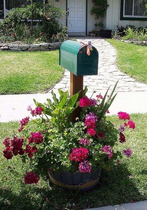 Repurposed Barrel Holds Mailbox and Bouquet