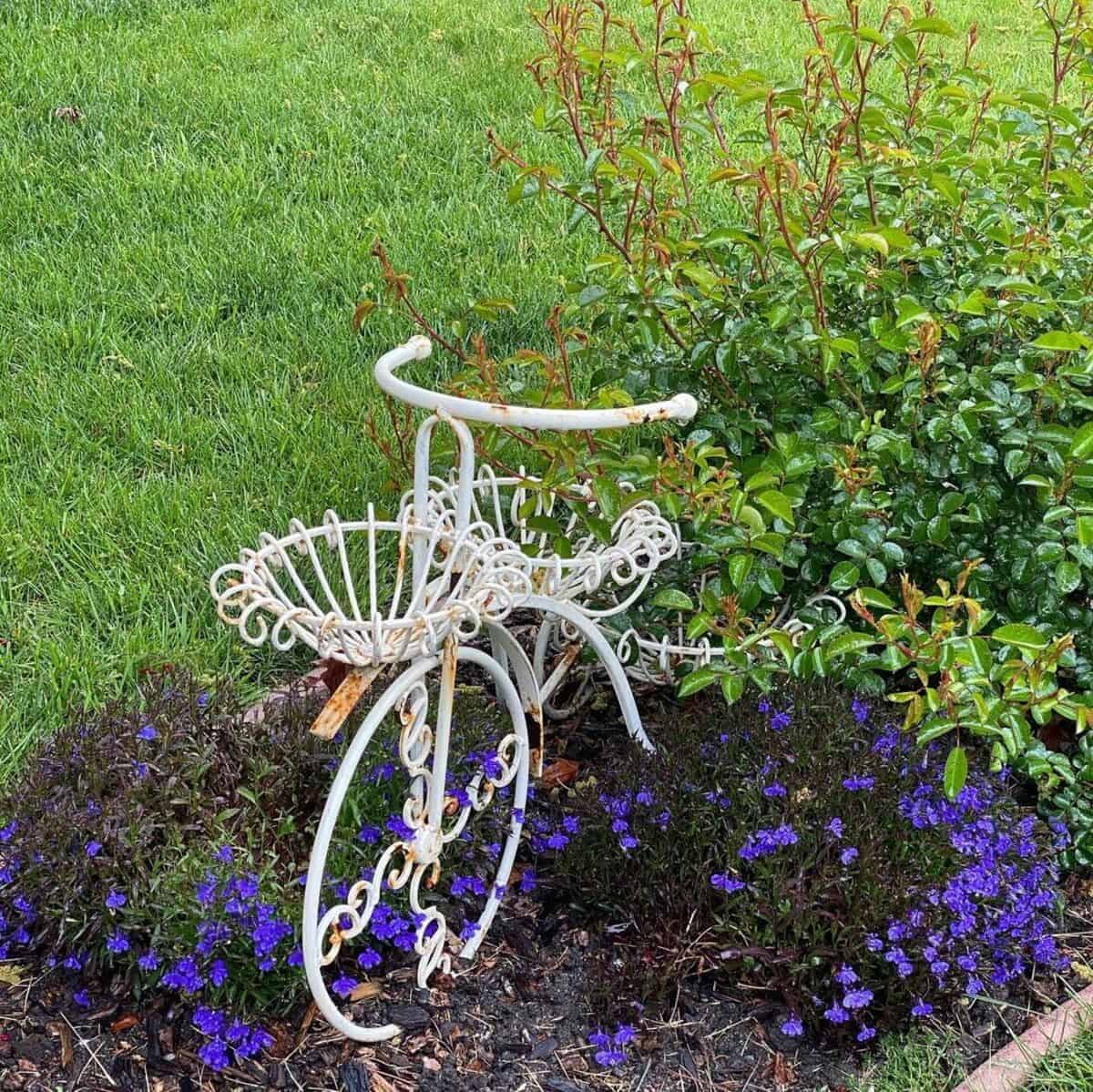 A Rusty Flower Stand Garden Decoration