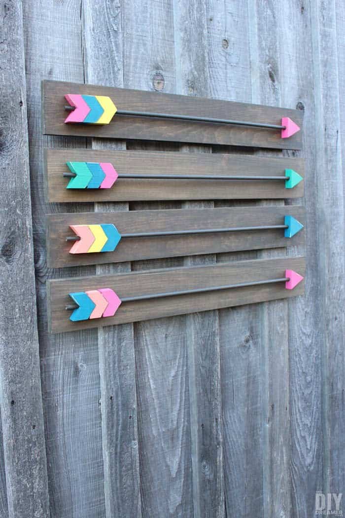 Reclaimed Wood Display With Colorful Arrows