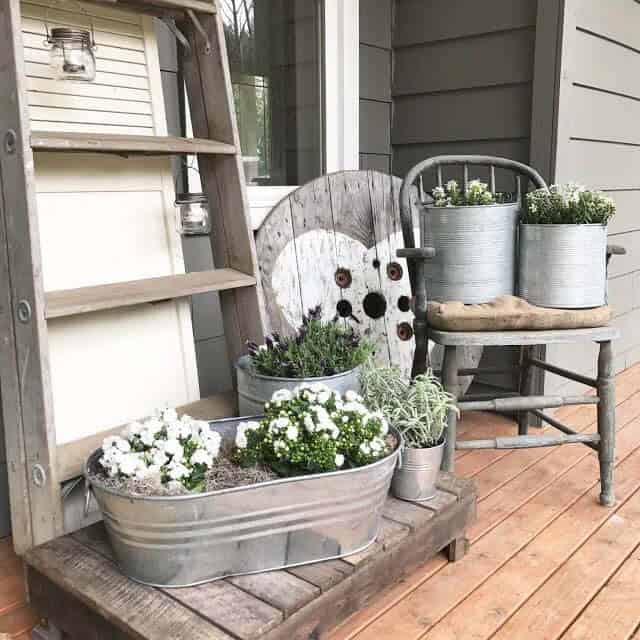 Galvanized Buckets With White Spring Blooms