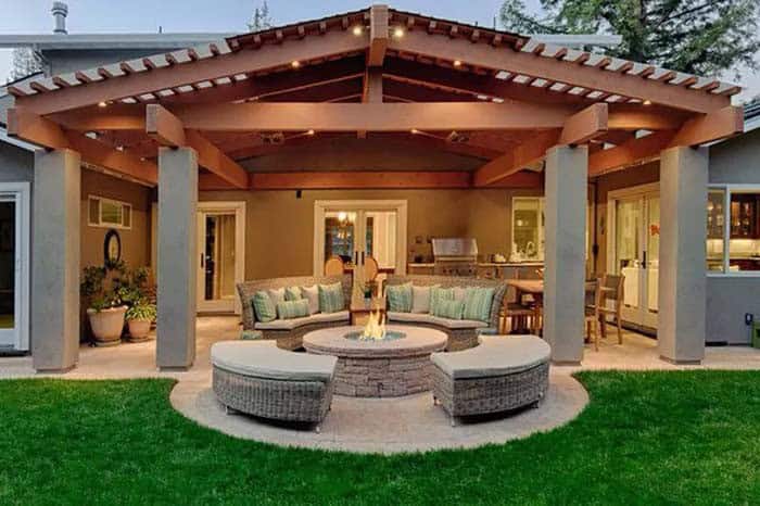 Balance Patio Design with Round Sectional Sofas and Fire Pits