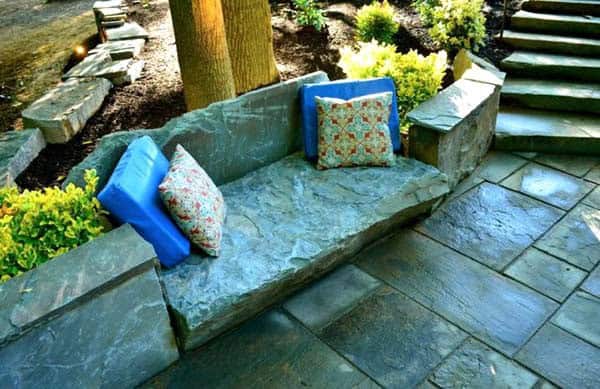 Adorn Your Garden with a Cozy Stone Bench