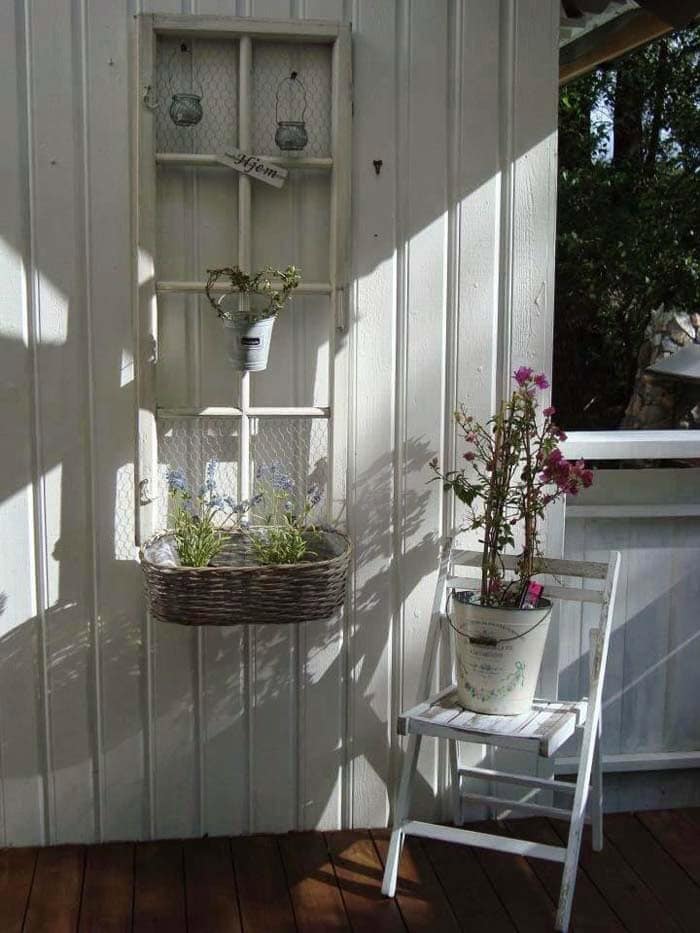 Rustic Decor with an Old Window Frame and Chicken Wire