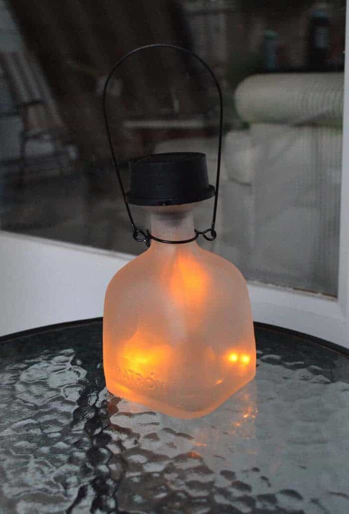 Illuminate Solar-Powered Decor with Frosted Bottles