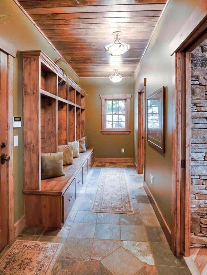 Utilize Space in a Hallway Mudroom with Bench and Pillows