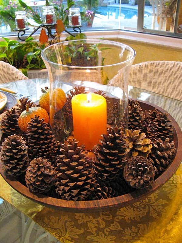 Accentuate Candle Luminary with Pinecones for a Rustic Look