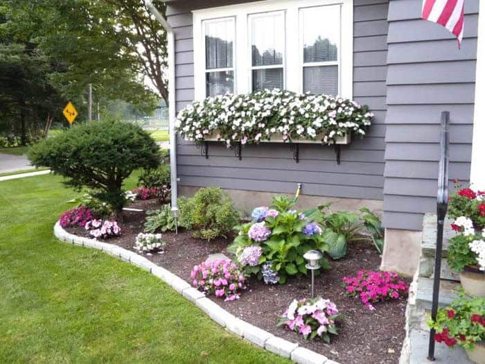 Cascade Flowers Over Flower Beds