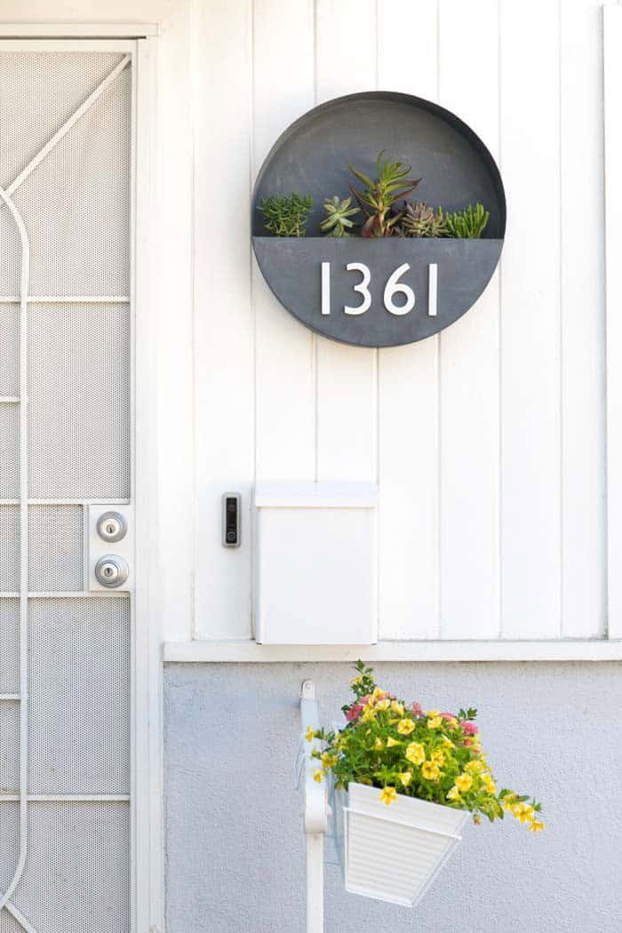 A Round Planter House Number