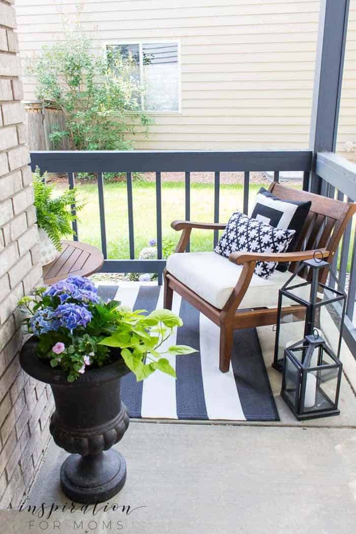 Bold Look with a Black and White Striped Rug on Your Porch