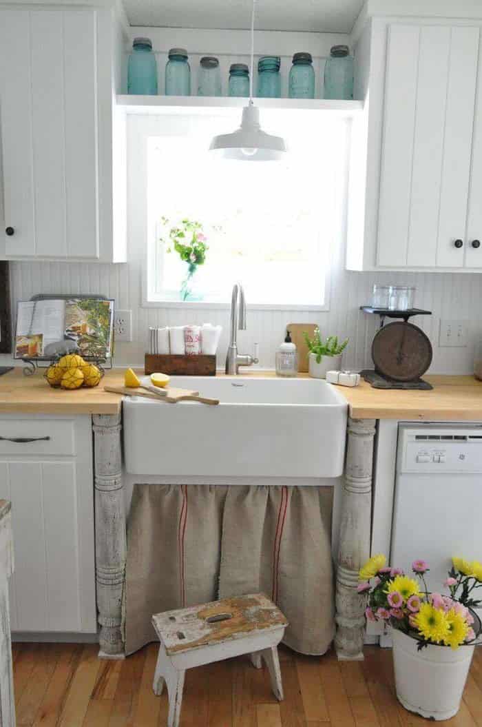 White Cabinets and Upcycled Table Legs for a Stylish Kitchen