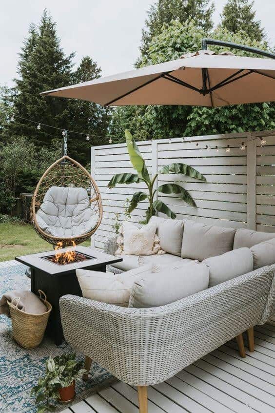 Boost Curb Appeal with White Wooden Deck and Furniture