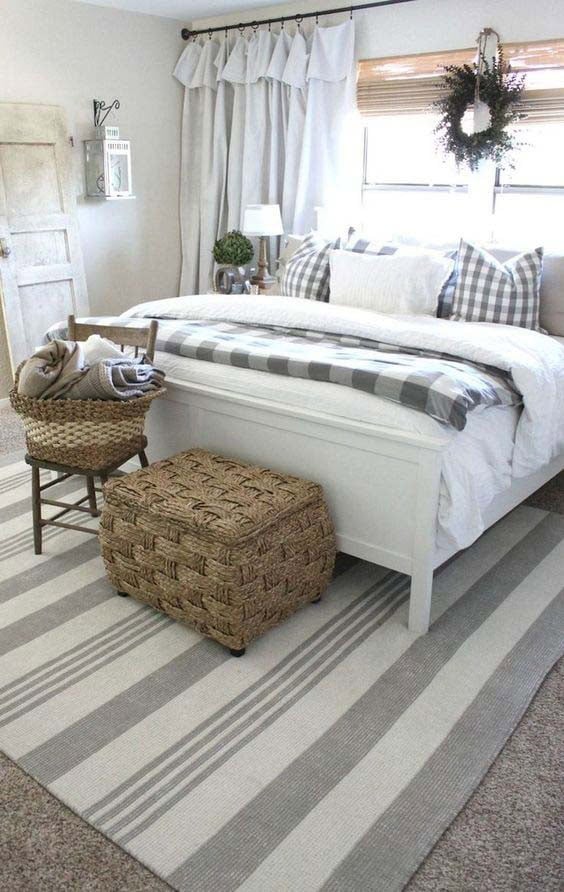 White and Grey Bedroom with a Rustic Wreath Accent