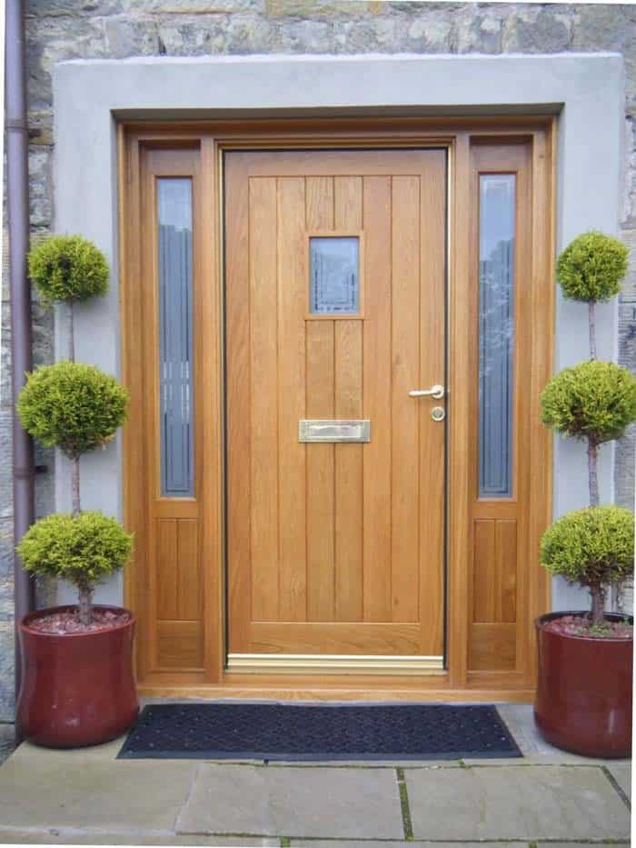 Warm Wood Contrasts A Stone Exterior