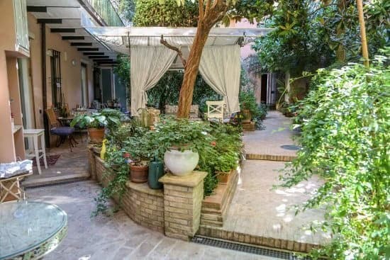 Pergola With Curtains To Ensure Privacy