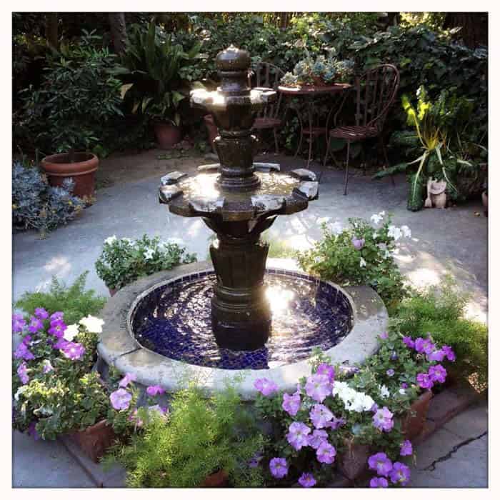 Patio Fountains Surrounded by Flower Boxes