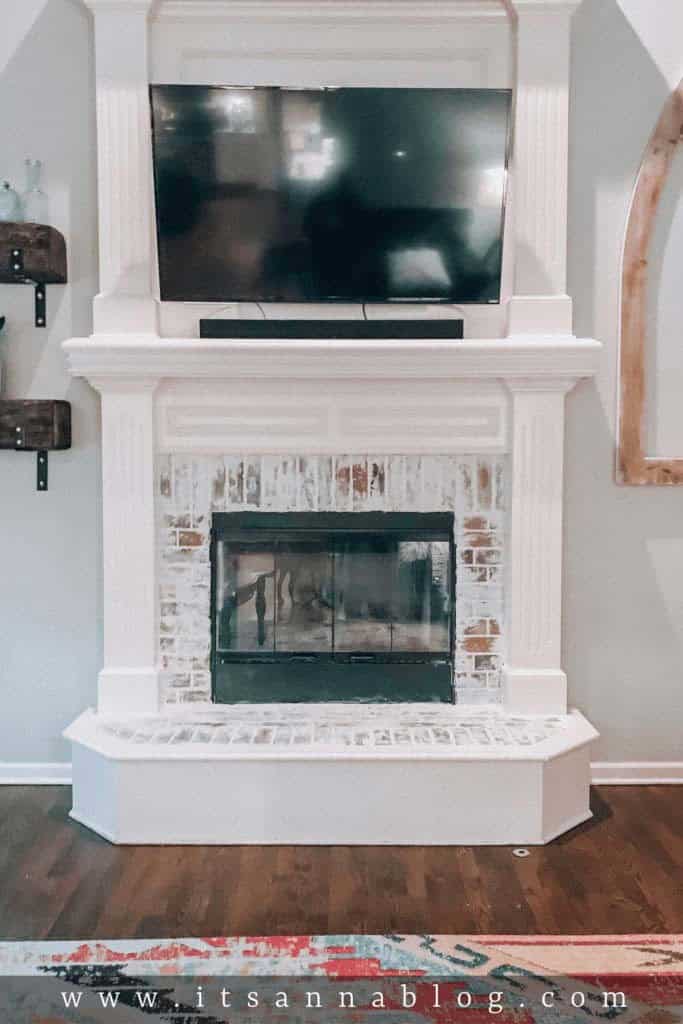 Whitewashed Brick Fireplace with Modern Farmhouse Charm