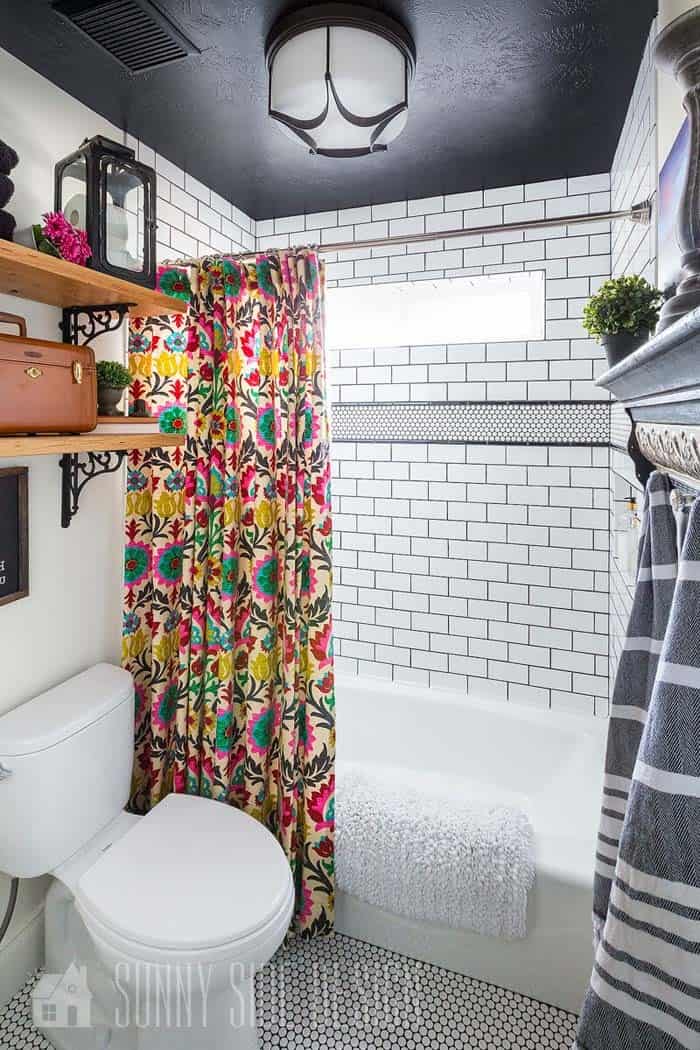 Standout Curtain Brightens A White Bathroom