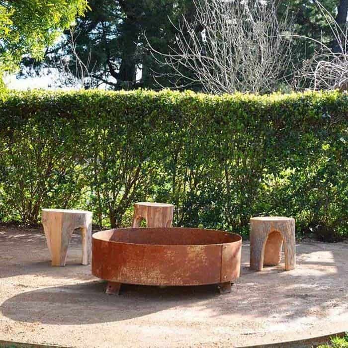 Uplift Your Backyard with Rustic Tree-Stump Fire Pit Stools