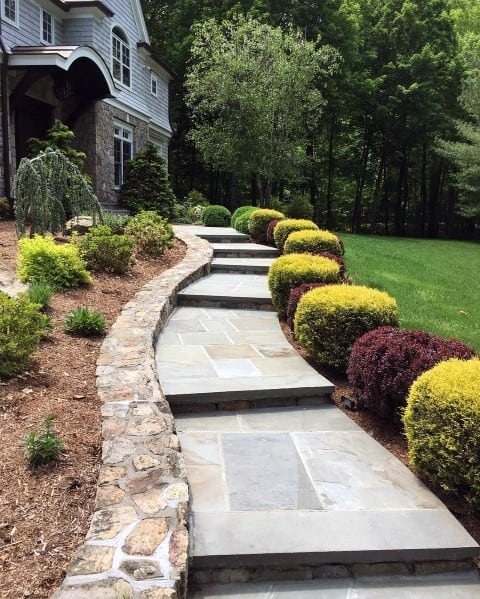 Stone Stairway with Cobblestone Wall to Entryway